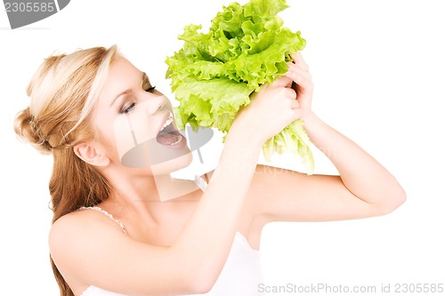 Image of happy woman with lettuce