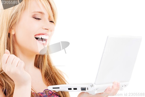 Image of teenage girl with laptop computer