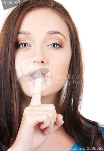 Image of finger on lips