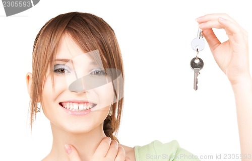 Image of happy teenage girl with keys
