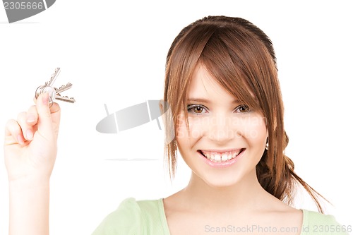 Image of happy teenage girl with keys