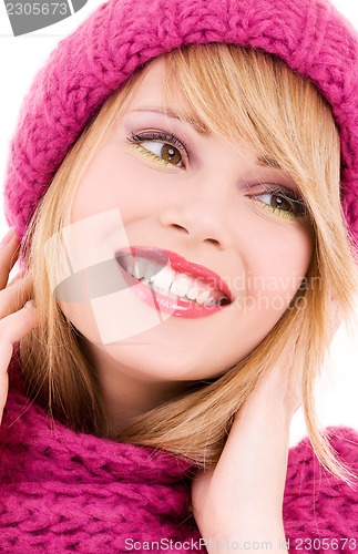 Image of happy teenage girl in hat