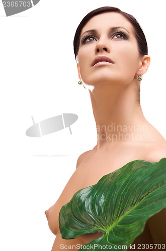 Image of woman with green leaf