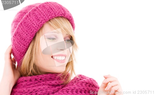Image of happy teenage girl in hat