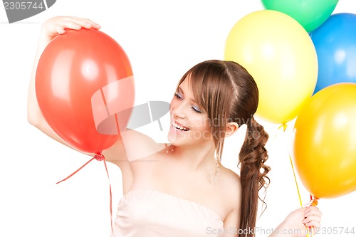 Image of happy teenage girl with balloons