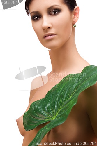 Image of woman with green leaf