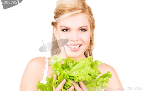 Image of happy woman with lettuce