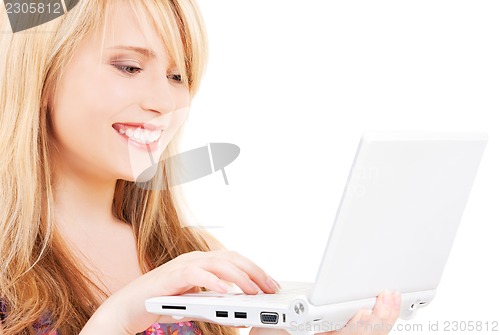 Image of teenage girl with laptop computer