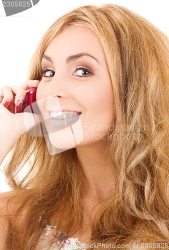 Image of happy woman with cell phone