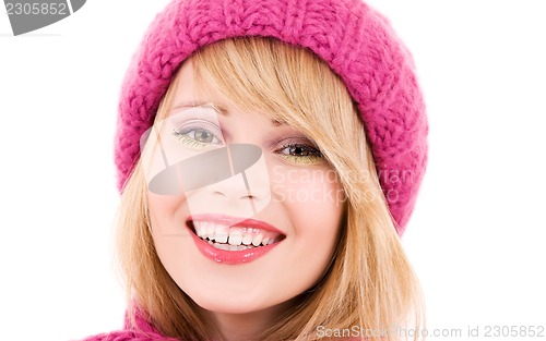 Image of happy teenage girl in hat