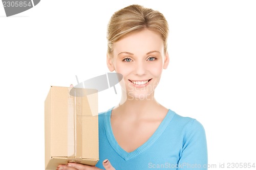 Image of businesswoman with parcel