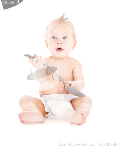 Image of baby boy with big spoon