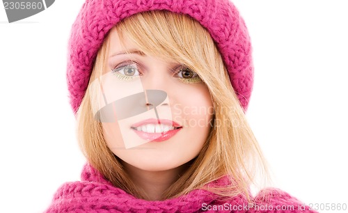 Image of happy teenage girl in hat