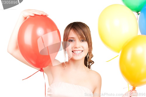 Image of happy teenage girl with balloons