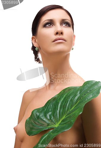 Image of woman with green leaf