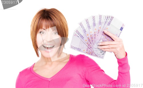 Image of happy woman with money