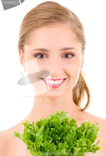 Image of happy woman with lettuce