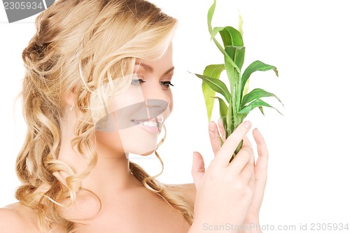 Image of woman with sprout