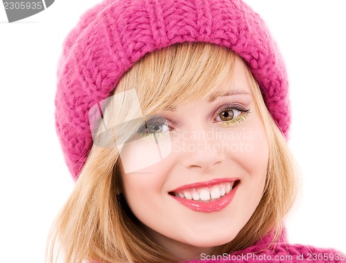 Image of happy teenage girl in hat