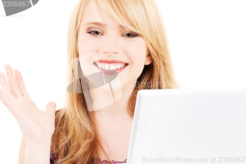 Image of teenage girl with laptop computer