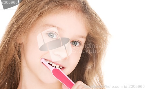 Image of happy girl with toothbrush