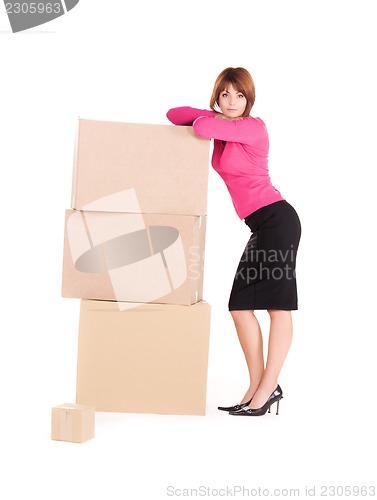 Image of businesswoman with boxes