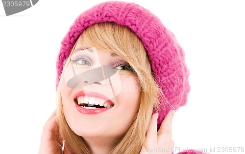 Image of happy teenage girl in hat