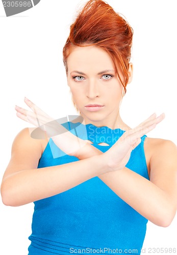 Image of woman making stop gesture