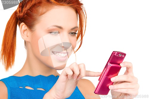 Image of happy woman with cell phone