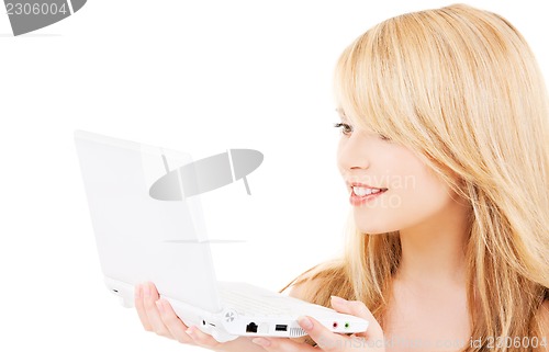 Image of teenage girl with laptop computer