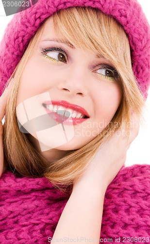 Image of happy teenage girl in hat