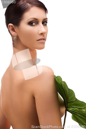 Image of woman with green leaf