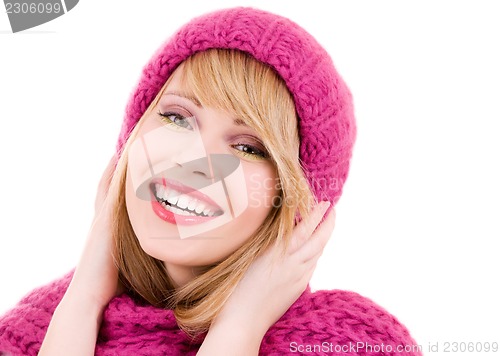 Image of happy teenage girl in hat