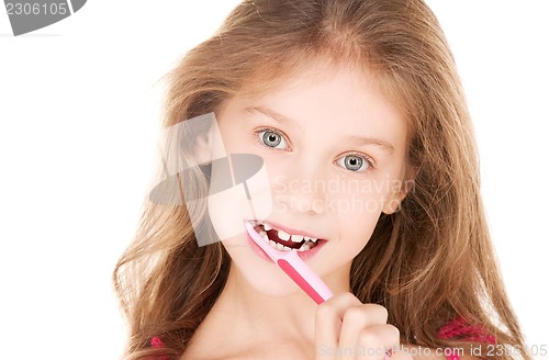 Image of happy girl with toothbrush