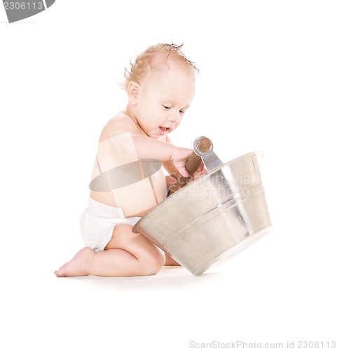 Image of baby boy with wash-tub