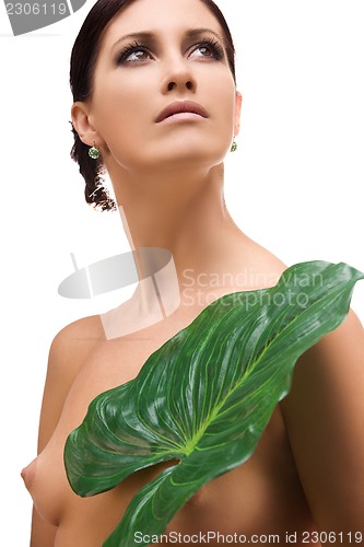 Image of woman with green leaf