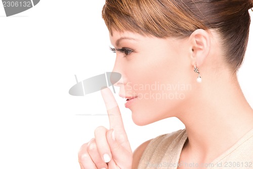 Image of finger on lips
