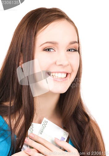 Image of lovely teenage girl with money