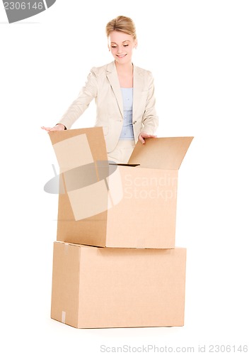 Image of businesswoman with boxes