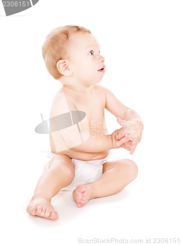 Image of sitting baby boy in diaper