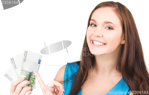 Image of lovely teenage girl with money