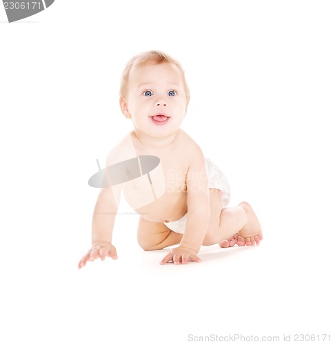 Image of crawling baby boy in diaper