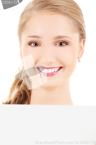 Image of happy girl with blank board