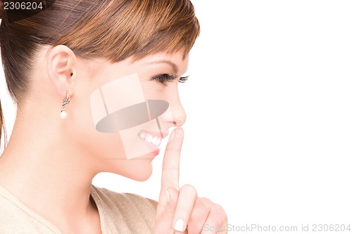 Image of finger on lips