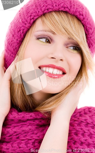 Image of happy teenage girl in hat