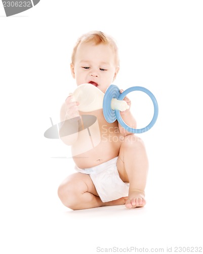 Image of baby boy with big pacifier