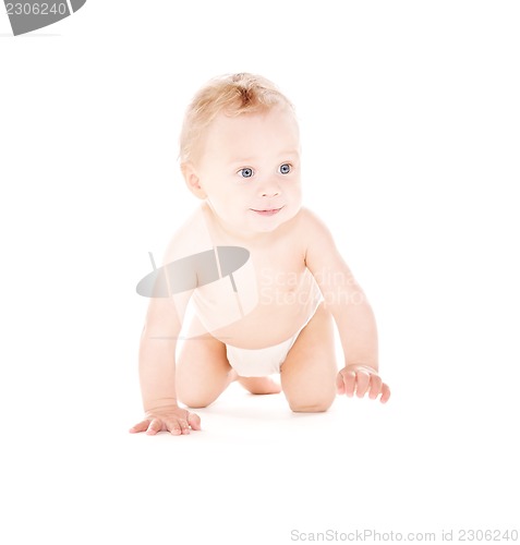 Image of crawling baby boy in diaper