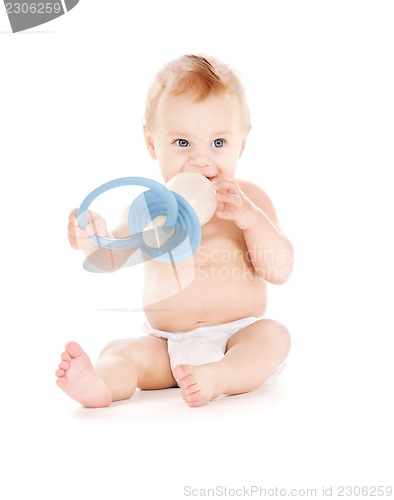 Image of baby boy with big pacifier