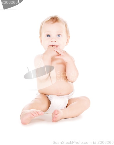 Image of sitting baby boy in diaper