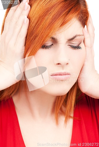 Image of unhappy redhead woman